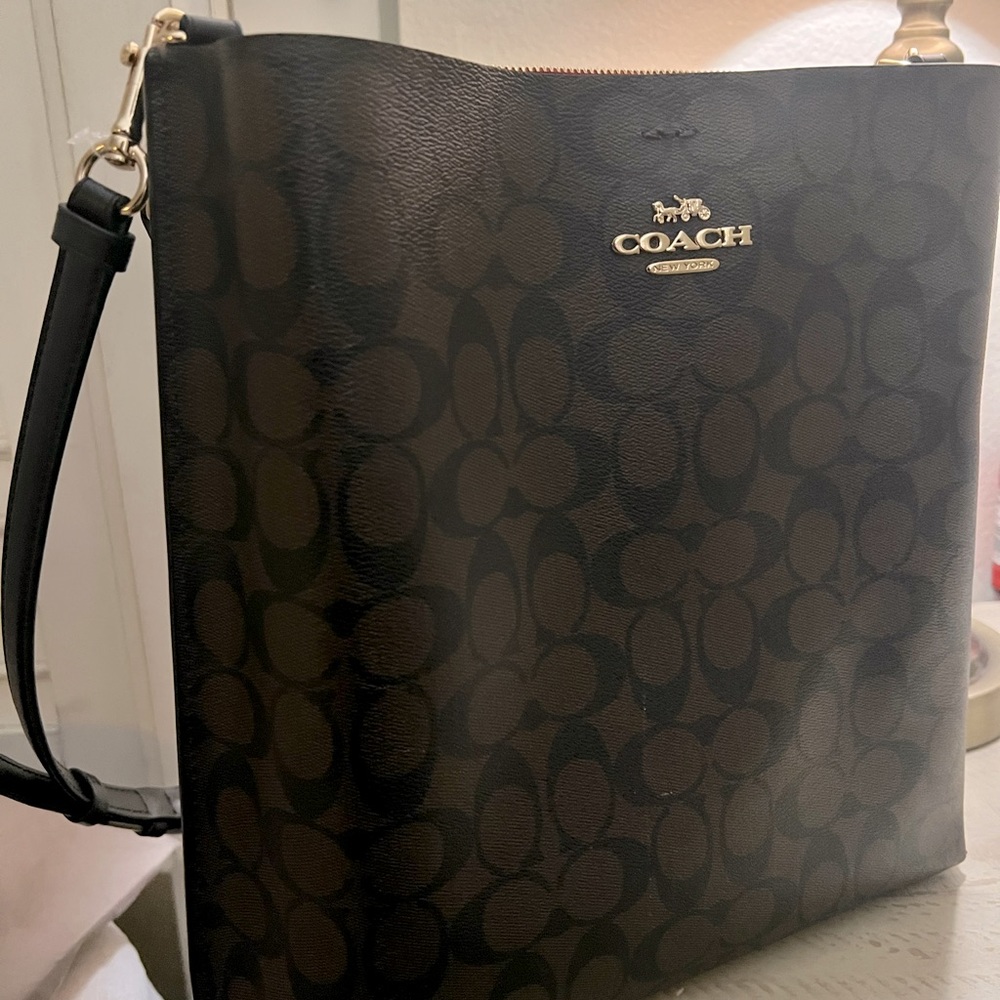 👜